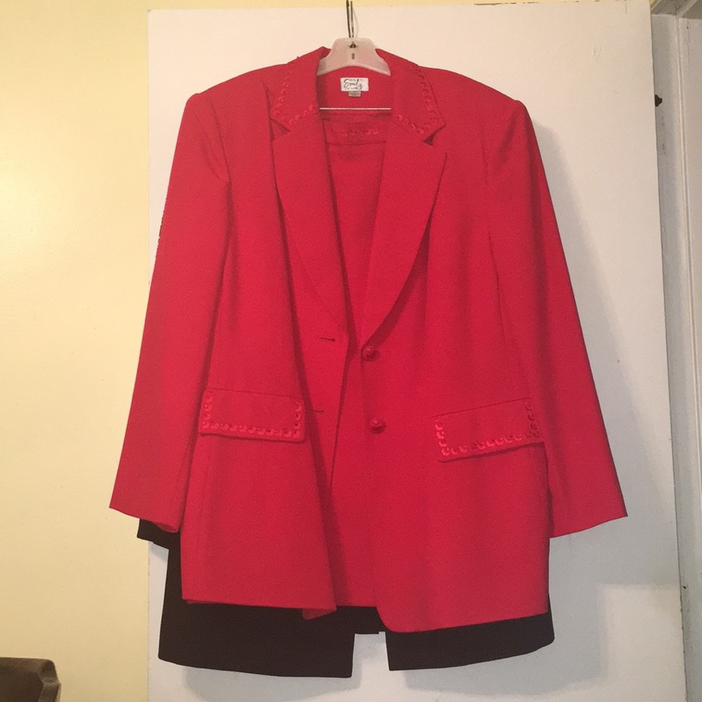 It is an red two piece skirt and jacket.